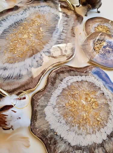 epoxu resin coasters in brown and gold colours