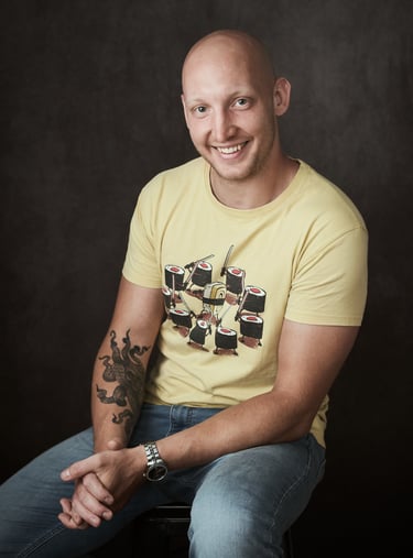 Picture of me sitting and smiling