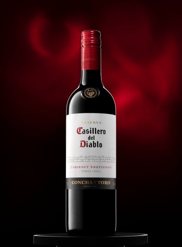 a bottle of wine with a red wine bottle