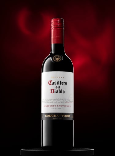 a bottle of wine with a red wine bottle