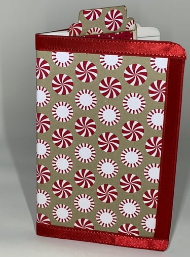 Christmas notebook with peppermint candy cover and hidden paper clip
