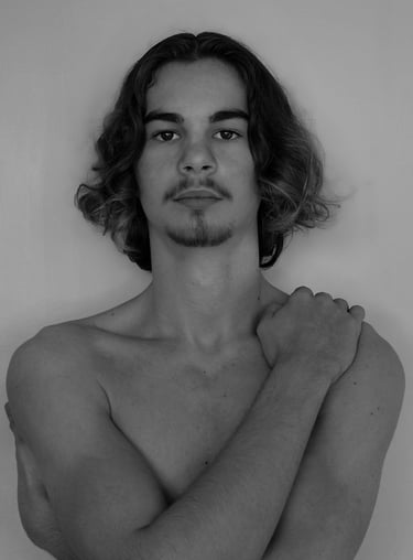 a man with a mustache and bare chest