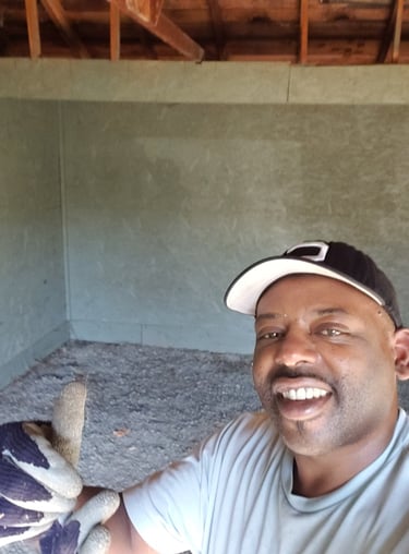 a man in a baseball cap and a glove