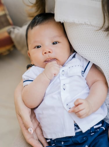 Baby portrait during a family photography session at Samabe Bali Suites & Villas in Nusa Dua.