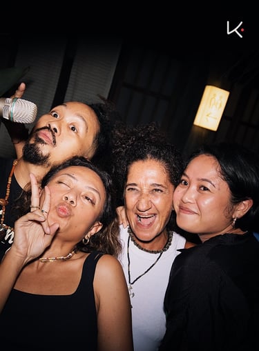 Kenji Ramen Bali vibrant evening atmosphere - izakaya dining with music and entertainment