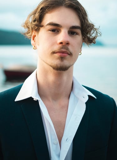 a man in a suit and white shirt