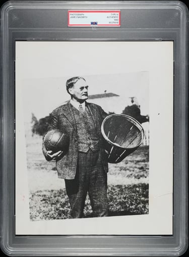 Photograph of the Inventor of Basketball, James Naismith, with a peach basket and ball
