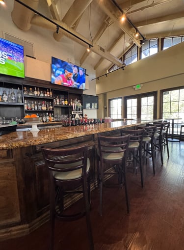Bar area at Dos Vientos Local Table in Newbury Park serving Italian wines and cocktails