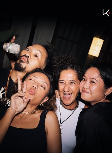 Kenji Ramen Bali vibrant evening atmosphere - izakaya dining with music and entertainment