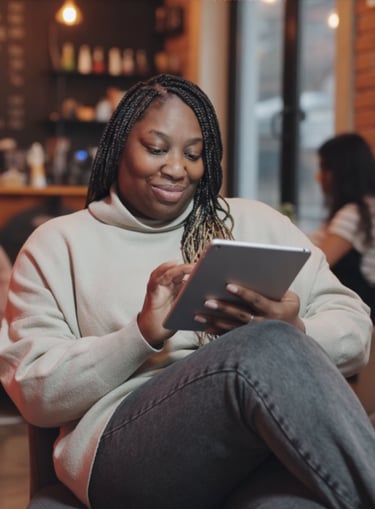 woman sitting in a cafe reading