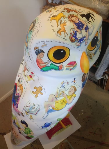 Glymfeather owl painted for Waterstones with book characters for Owls of Bath by Laura Fearn