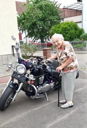 elderly woman next to a motorcylcel - copyrights Tanja Dietzig