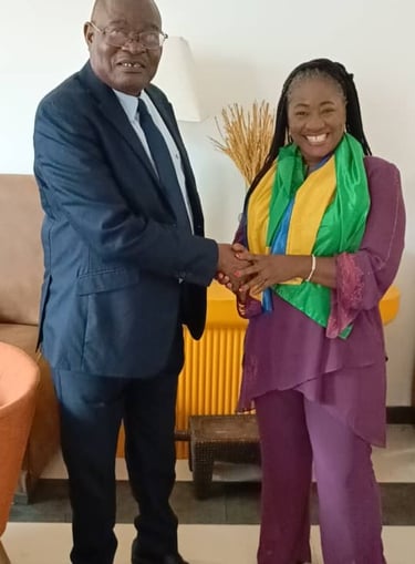 a man and woman shaking hands in a room