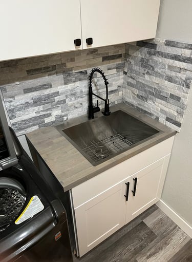 Laundry room sink, cabinet and backsplash replacement