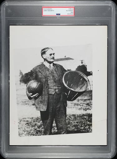 Photograph of the Inventor of Basketball, James Naismith, with a peach basket and ball