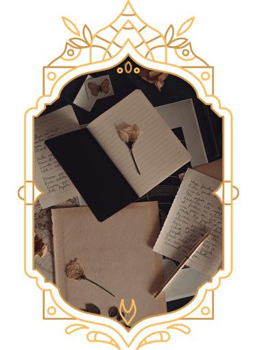 notebooks and roses in a victorian frame