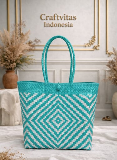 Handmade plastic woven bag with Indonesian batik geometric pattern in teal and white