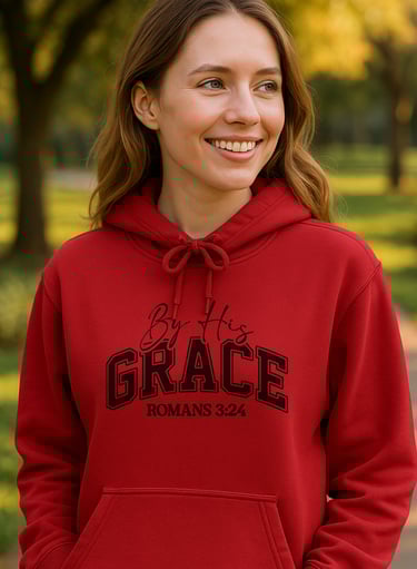 a woman in a red hoodie by jis grace romans 3:24