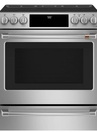 A modern stainless steel freestanding range with a digital clock display and multiple control knobs on the top panel.