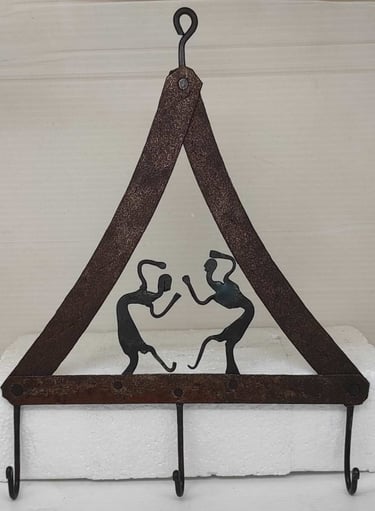 "Handcrafted iron wall-mounted key hanger with ethnic tribal style–front view-for global buyers"