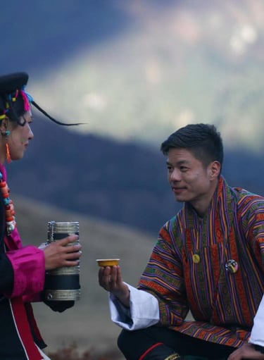 Bhutanese-way-of-offering-local-rice-wine-honoring-the-guests