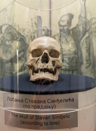The skull of Stevan Sindjelic displayed in a glass case at the Skull Tower museum in Nis, Serbia.