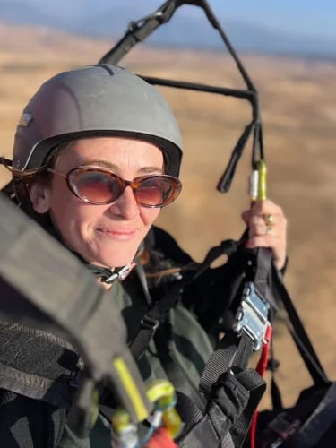 An American traveler paragliding in Atlas