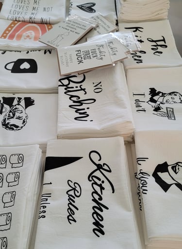 Several of out tea towels layed out