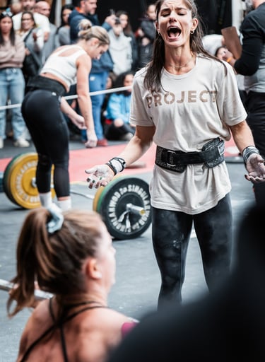 a woman in a white shirt and black pants