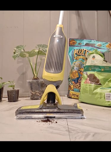 Shark VacMop cordless vacuum and mop used for quick floor cleaning.