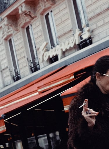 a woman in a fur coat smoking a cigarette