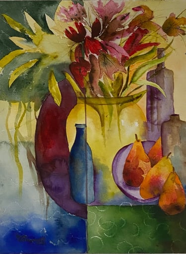 Yellow vase filled with red and pink flowers surrounded by bottles and pears in a patchwork of color
