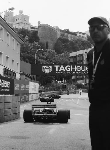 a race marshal watching the race cars get onto the circuit