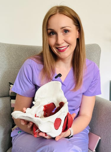 a woman in scrubs sitting on a couch