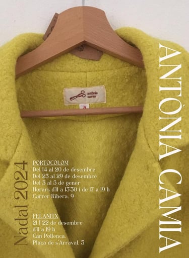 a yellow coat with a wooden hanger and a wooden hanger
