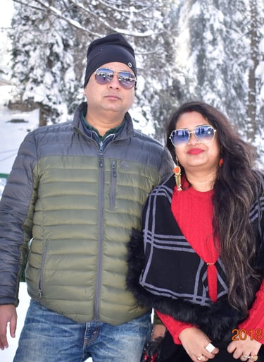 a couple on there kashmir trip posing in snow