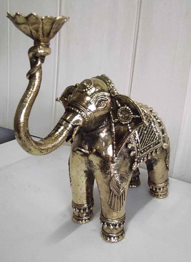 "Designer brass elephant with lotus in upward trunk and tribal carvings, left side-Export-oriented"