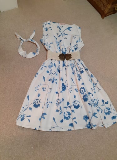 1950's style white dress with blue flower design