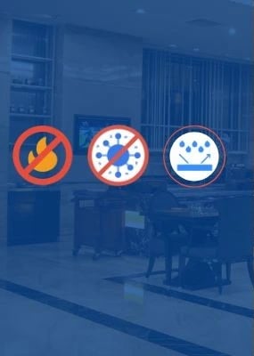 Icons for fire resistance, antimicrobial protection, and water repellency over a modern lobby.