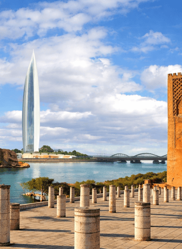 a clock tower with a view of a city