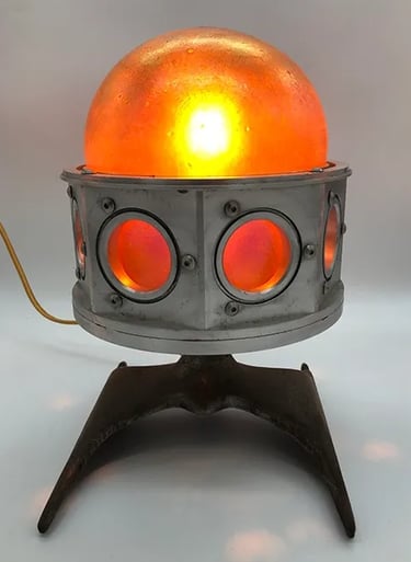 Lamp made from custom blown orange glass in aluminum body.