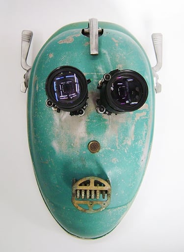 Assemblage robot head named Eyeborg built by sculptor Tal Avitzur.