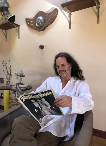 Artist Tal Avitzur in home gallery.