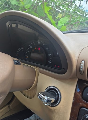 Car key in ignition of a 2003 Mercedes - car locksmith service