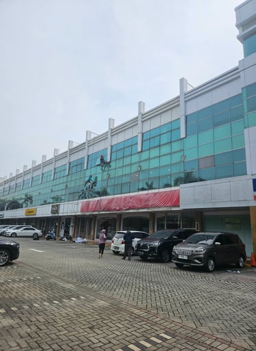 Pembersihan Kaca Gedung