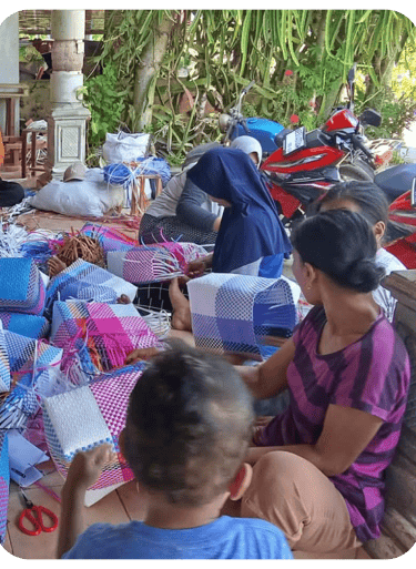 Handmade jali jali woven bags crafted by local artisans at Craftvitas Indonesia ready for final production stage.