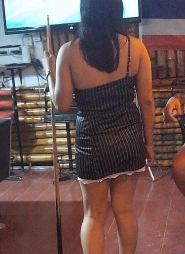 Thai woman playing pool at bar on Soi 94 in Hua Hin