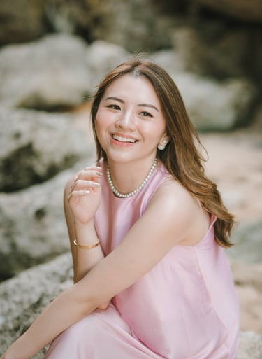 Smiling portrait of a woman during friends photoshoot at Geger Beach Nusa Dua Bali