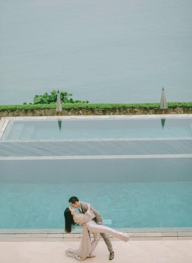 Romantic prewedding portrait by infinity pool at Amankila Karangasem Bali