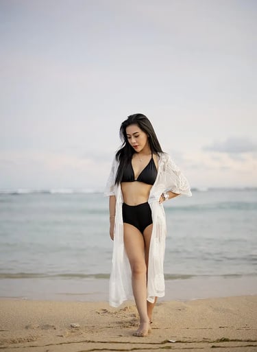 Lifestyle fashion portrait on the beach at The Apurva Kempinski Bali